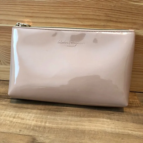 Salvatore Ferragamo cosmetic bag. Can be worn as a clutch as well